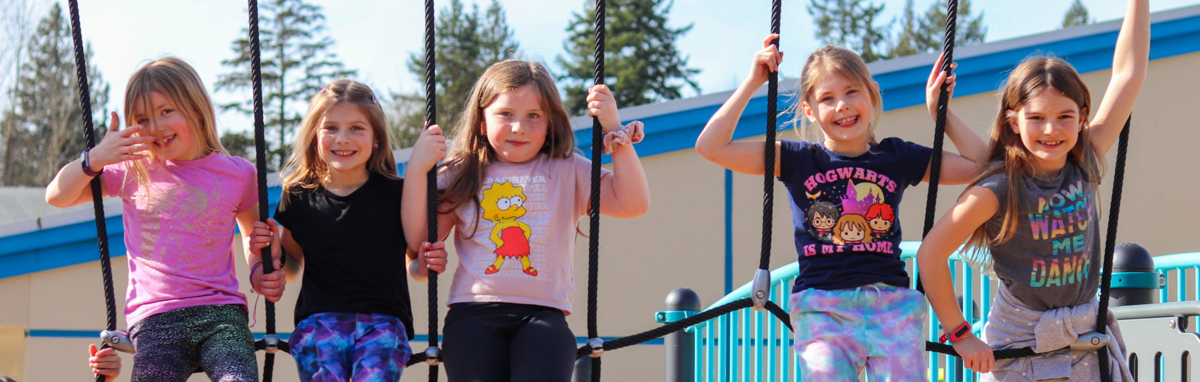 girls-group-climbing-rope-playground-grade-2-scaled-e1644358321221.015e167038.jpg